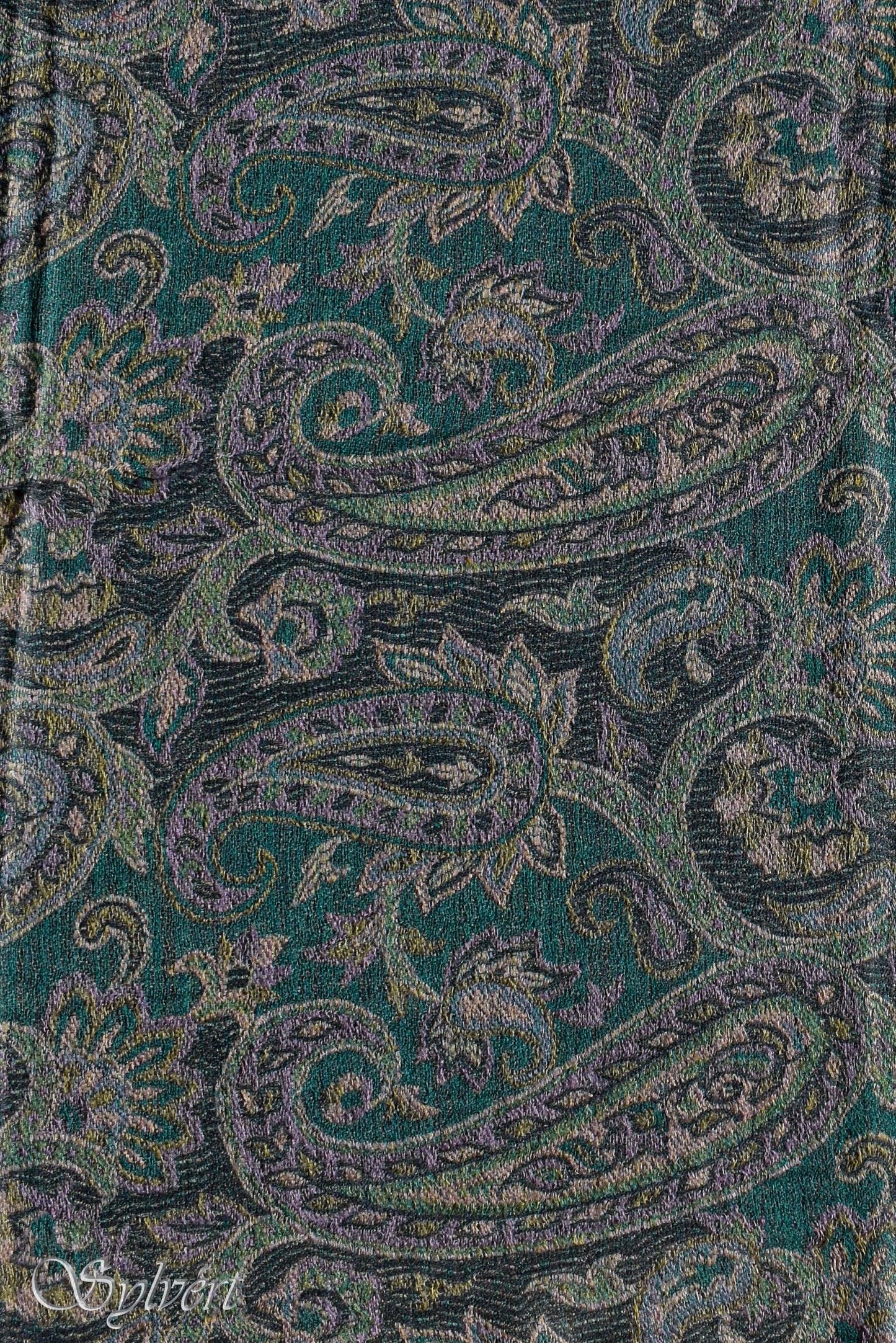 A close up product image of a green based, multicolour paisley bordered Corvello "Jamawar" pashmina stole from Sylvért's Coronis collection