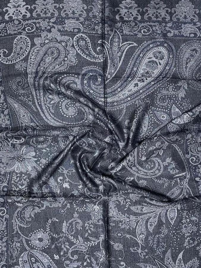 Grey shawl with intricate paisley and floral jacquard patterns in textured fabric