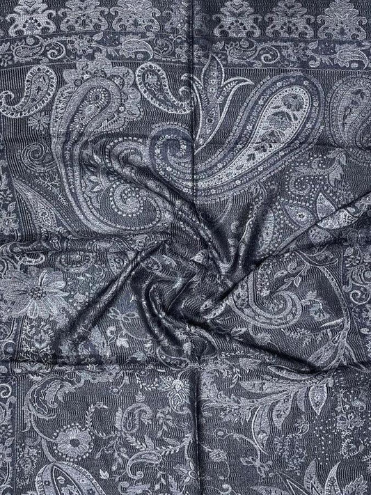 Grey shawl with intricate paisley and floral jacquard patterns in textured fabric
