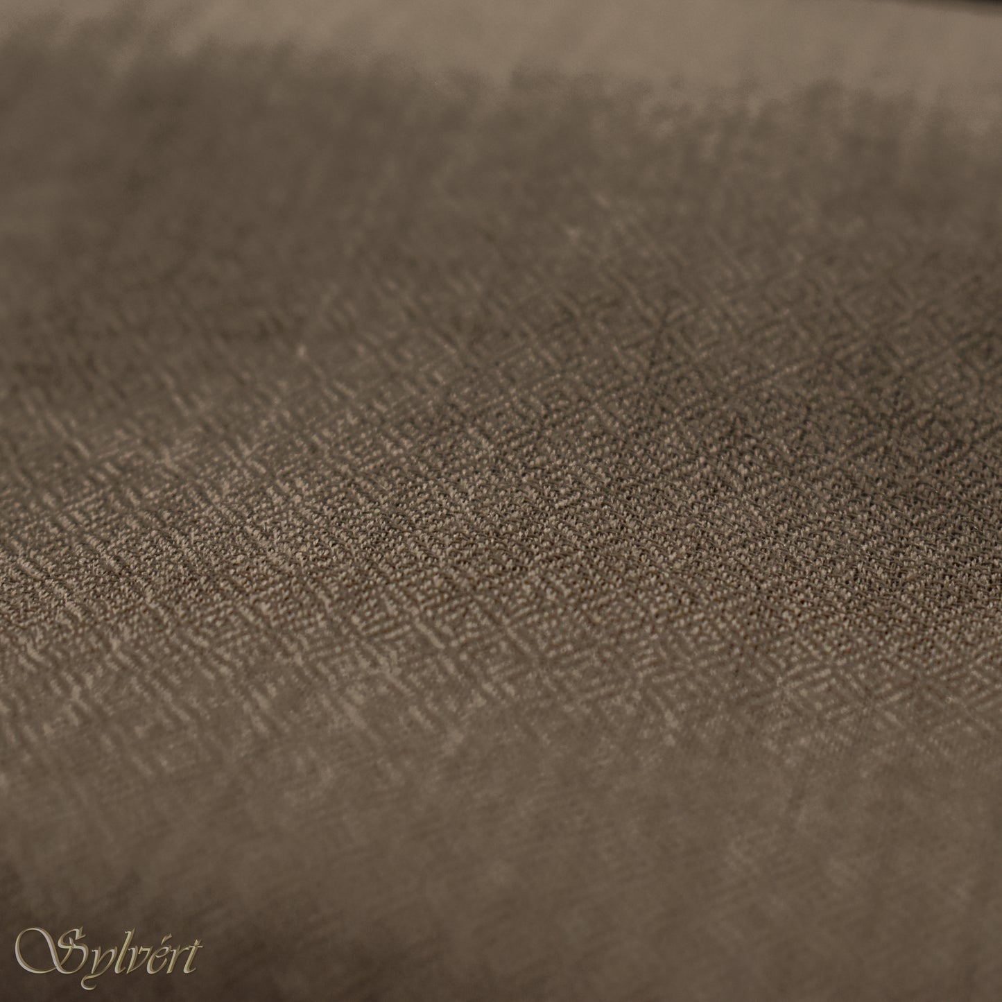 A natural "blush" cashmere Rivella Relor Scarf from Sylvért's Rivanor Collection, showing the diamond weave texture